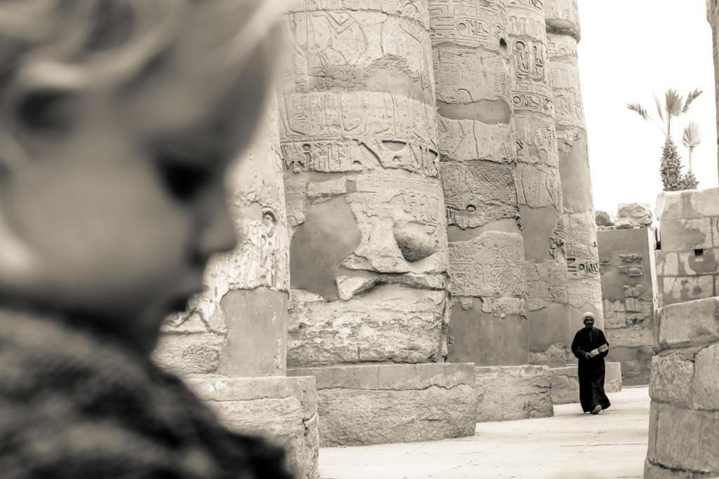 Girl in front of ancient temple in Luxor not far from El Gouna