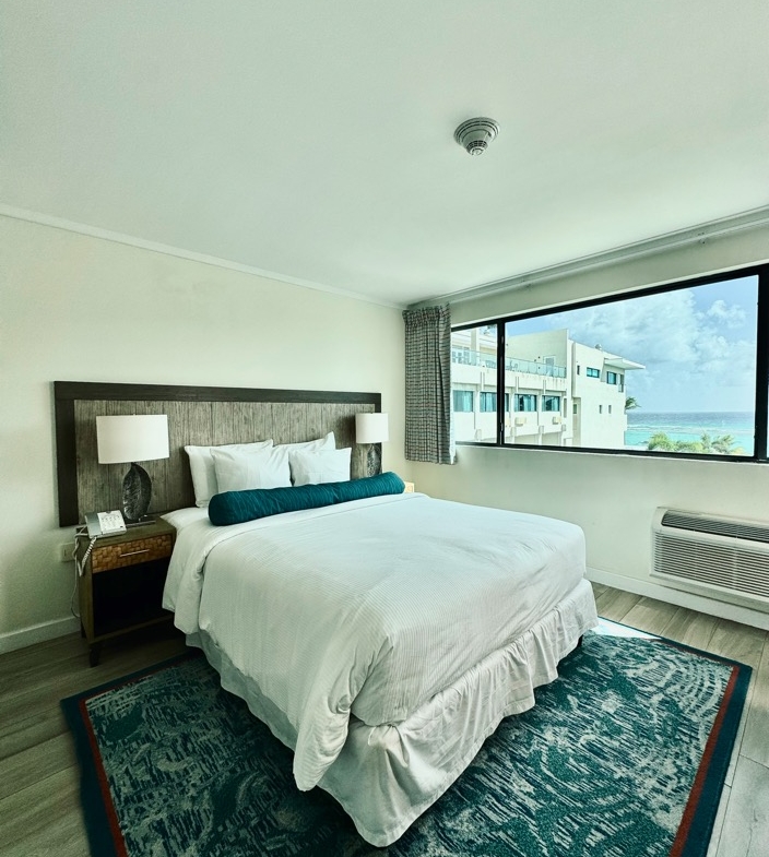 Two-bedroom condo at The Sands Resort, Christ Church, Barbados, with contemporary finishes and a cozy living area