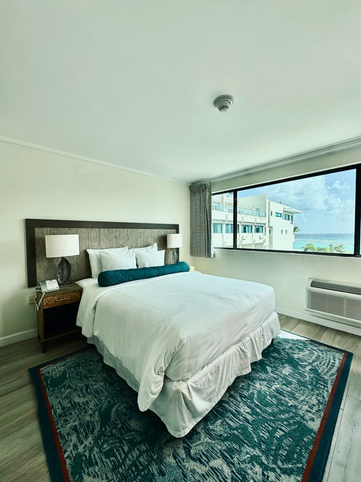 Two-bedroom condo at The Sands Resort, Christ Church, Barbados, with contemporary finishes and a cozy living area