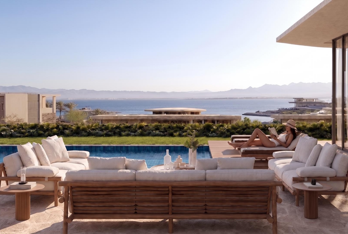 Villa Nautilus 222: poolside seating with red sea outlook — approved CO-LAB architectural visualisation