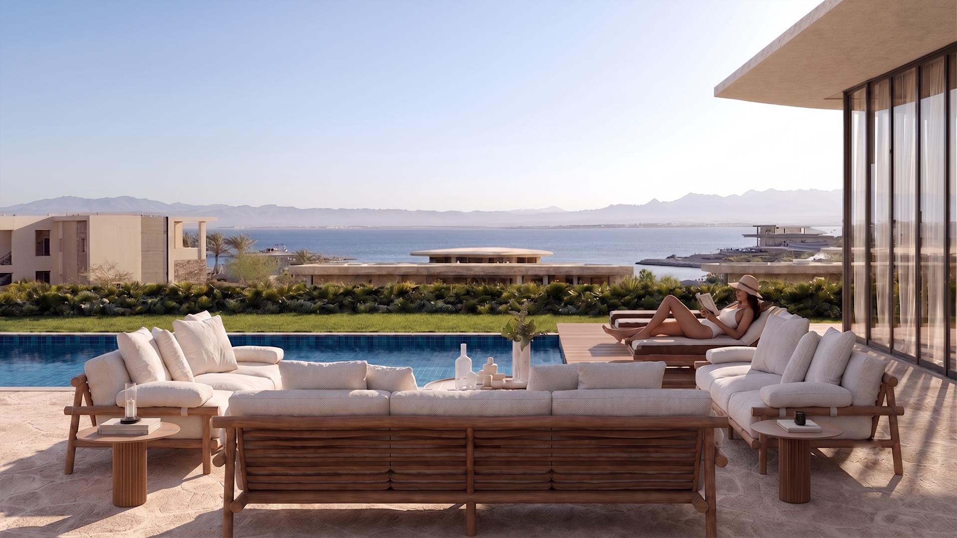 Villa Nautilus 222: poolside seating with red sea outlook — approved CO-LAB architectural visualisation
