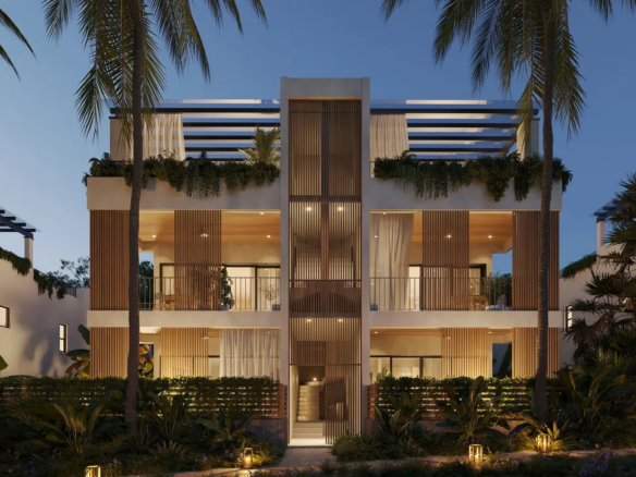 Porters Palms Barbados building with balconies and palm trees at dusk